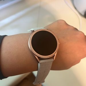 Michael Kors pink smart watch
